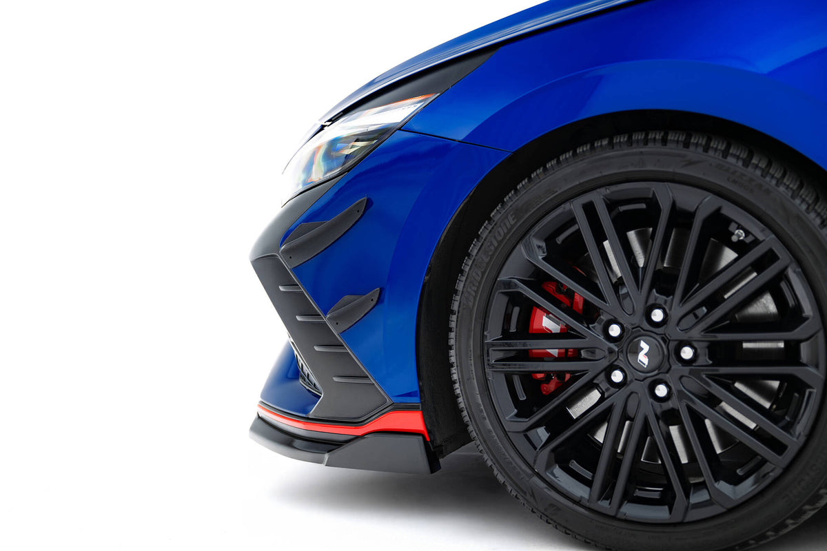 Nærbilde av canard i ABS-plast for Hyundai Elantra N Mk7 med strukturert overflate