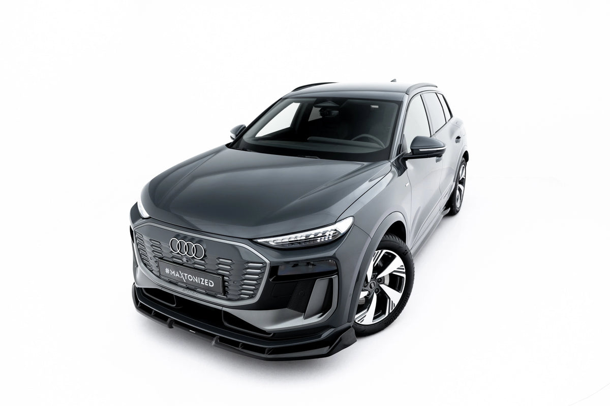 Nærbilde av blank sort frontsplitter til Audi Q6 e-tron S-Line