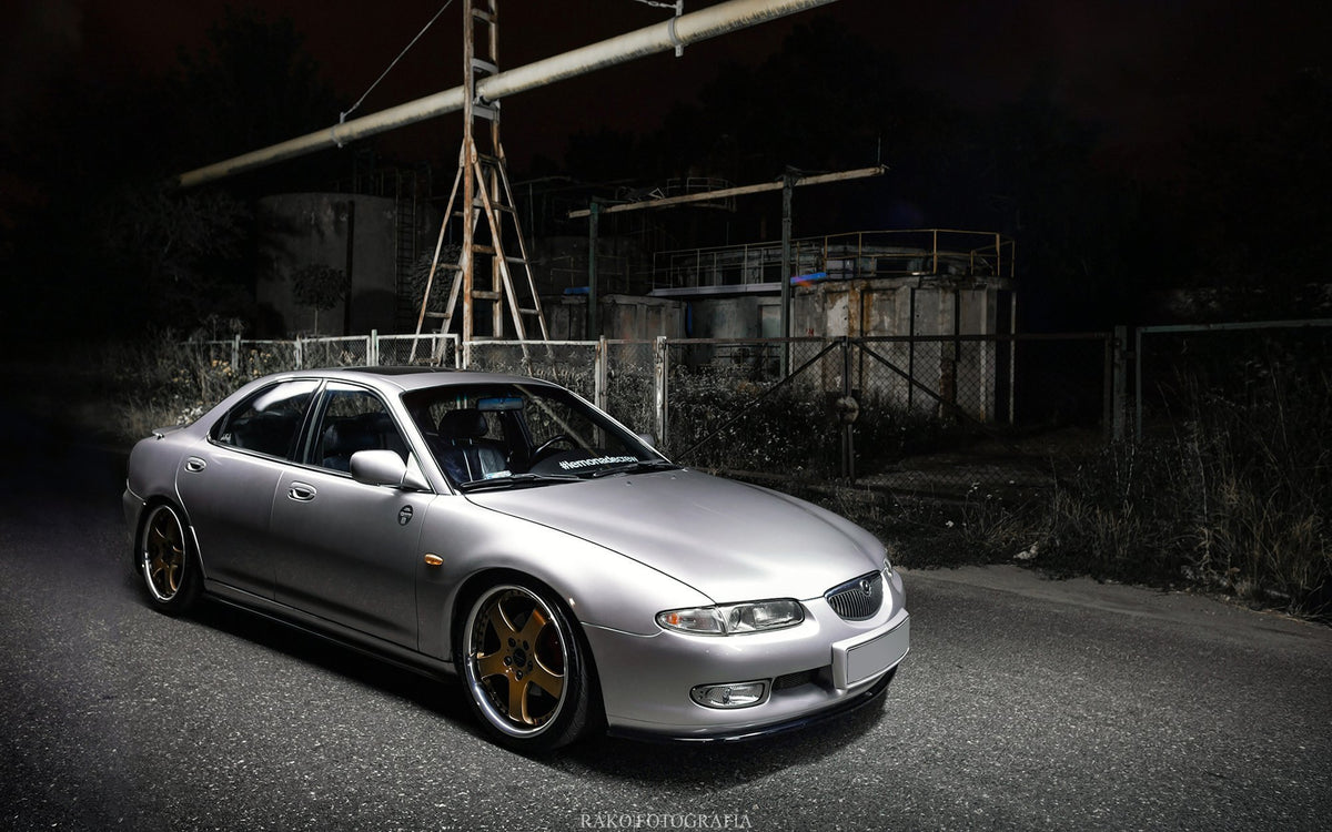 Frontspoiler fra Maxton Design til Mazda Xedos 6 sett forfra i strukturert svart
