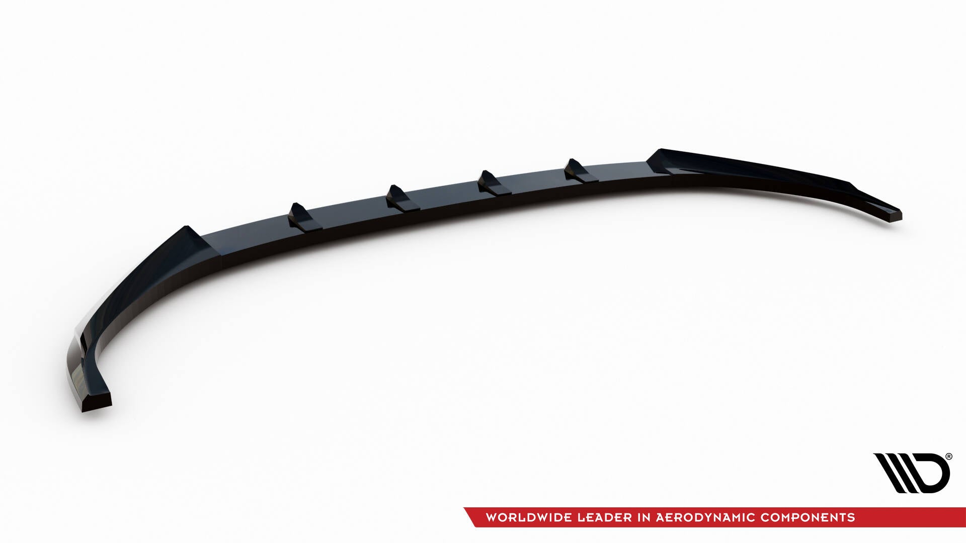 Front lip på Skoda Enyaq Coupe Iv RS, svart buet spoiler med vertikale finner og glanset overflate.