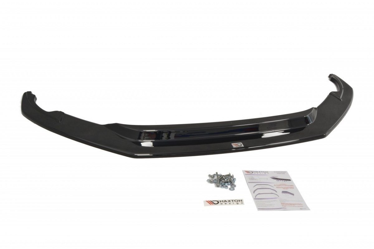 Frontspoiler Audi R8 MK2 V.1 i sort, glanset plast med monteringsskruer og instruksjoner foran på hvit bakgrunn.