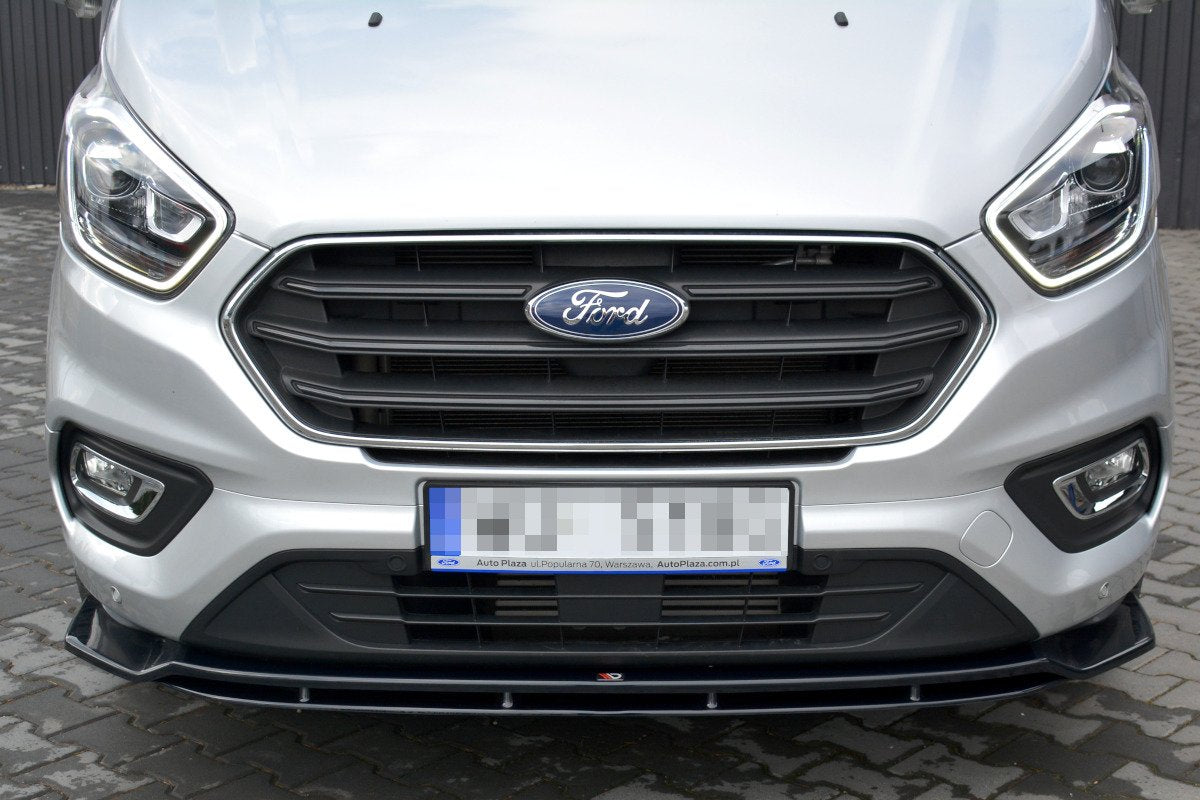 Spoiler til Ford Transit Custom MK1 Facelift med sort frontsplitter og markant frontgrill.