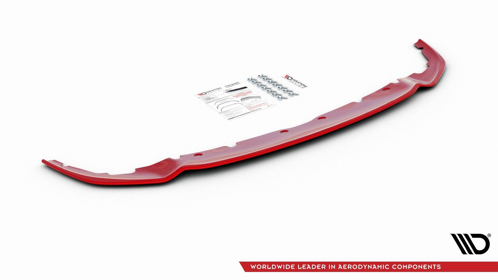 Front lip til BMW 1 M-Pakke F40, rød plast med monteringsskruer og instruksjonsark på hvit bakgrunn.