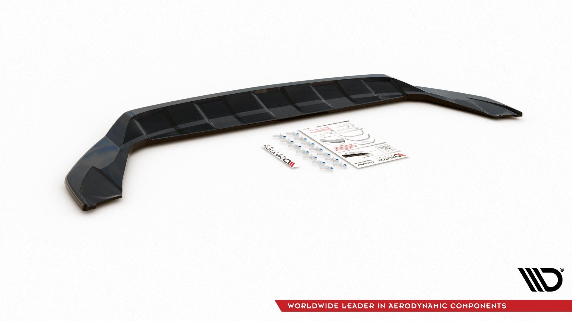 Frontspoiler VW T-Cross sort plastdel med monteringsutstyr og instruksjoner mot hvit bakgrunn.