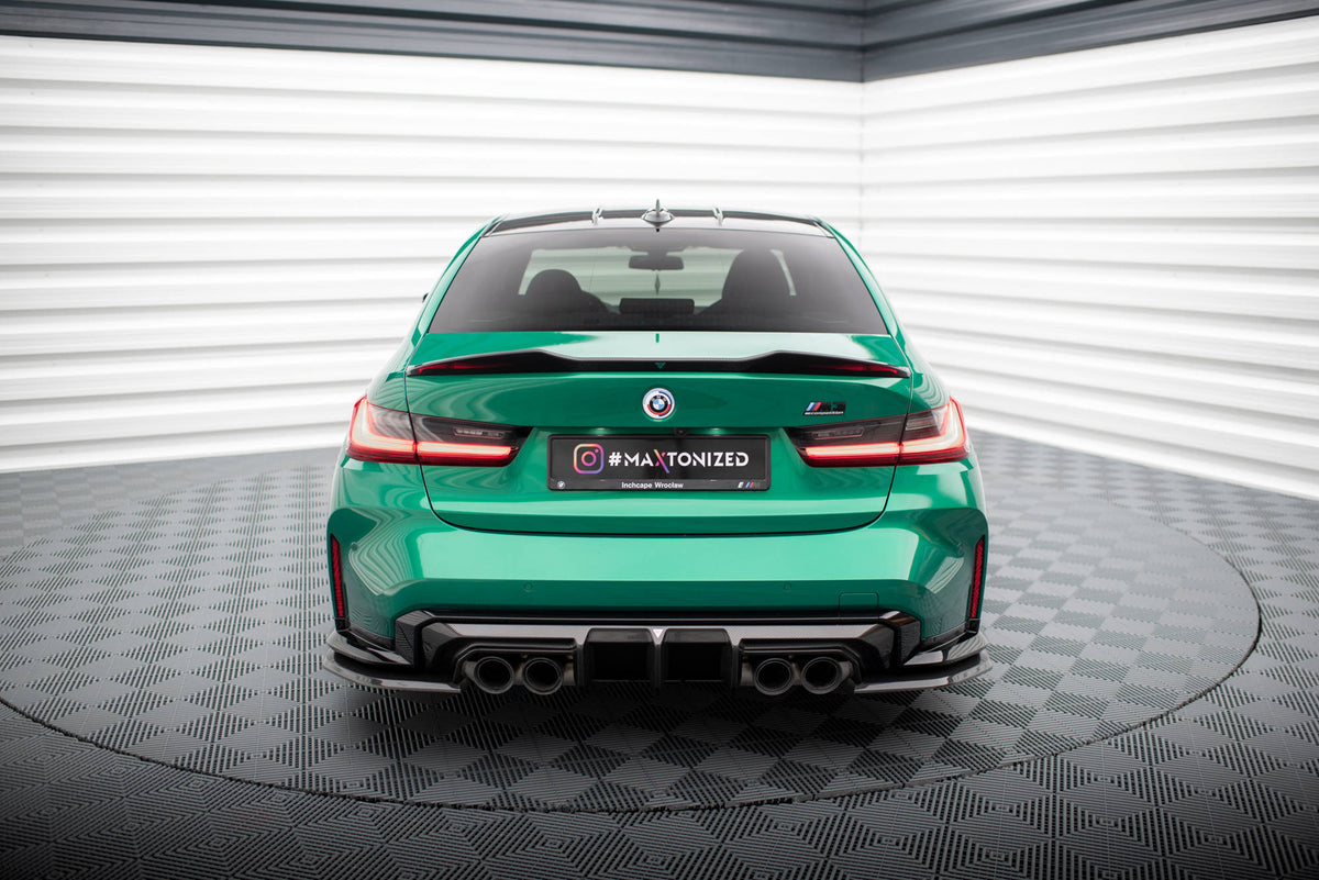 Nærbilde av uniform karbonstruktur på diffuser til BMW M3 G80