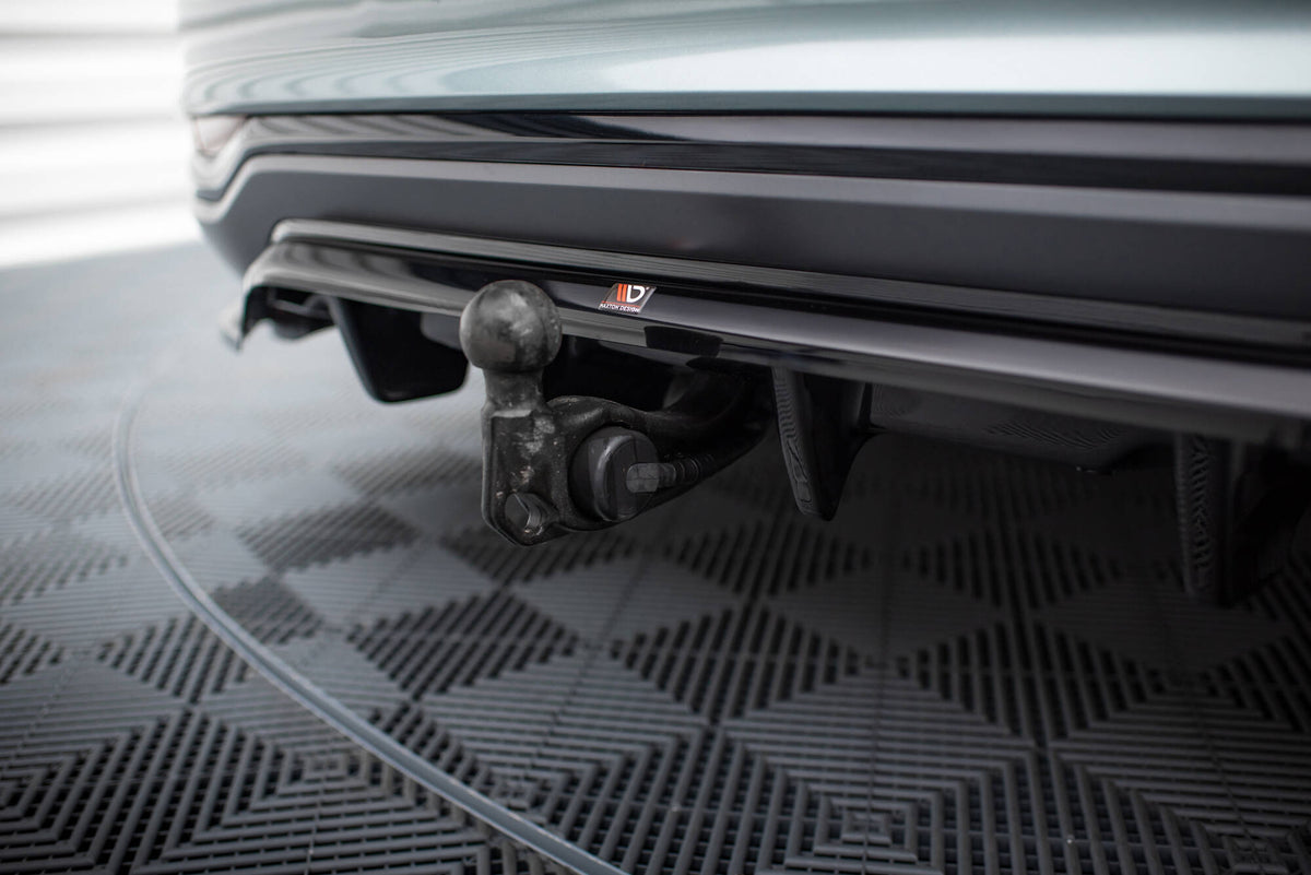 Nærbilde av vertikale stenger på diffuser til Audi A6 Allroad C8