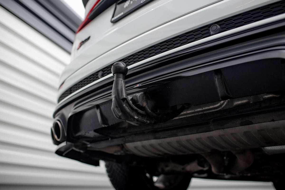 Detaljbilde av vertikale stenger på diffuser til Audi SQ8