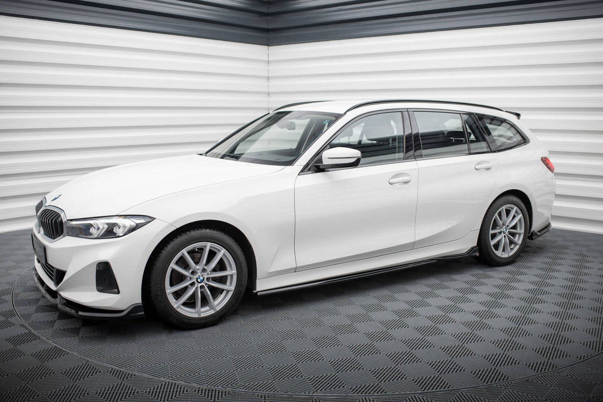 Nærbilde av blank svart overflate på sideskjørt diffusor for BMW 3 G21 Touring