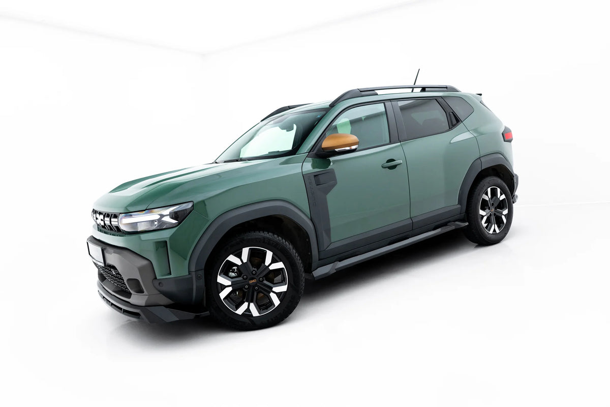 Nærbilde av sideskjørt diffuser montert på terskelen til Dacia Duster Mk3