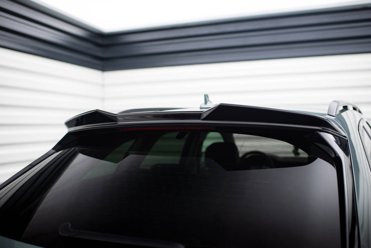 Spoiler cap 3D til Audi A6 Avant C8 i strukturert sort finish, sett bakfra