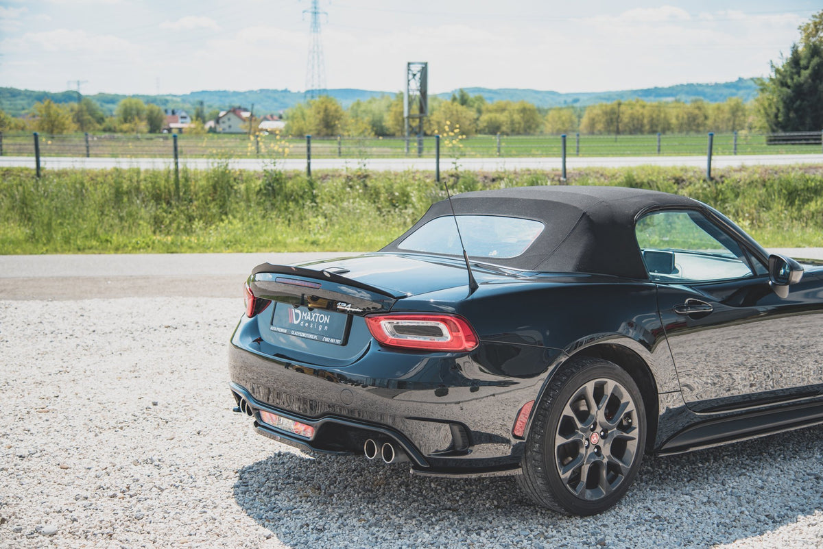 Spoilerforlenger i sort ABS-plast til Abarth 124 Spider, skrå vinkel
