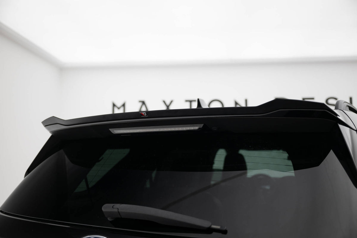 Spoiler cap for Ford Explorer XLT Mk6 i blank svart finish, sett bakfra