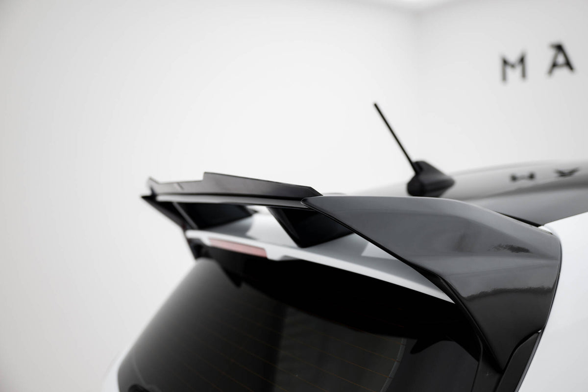 Nærbilde av spoiler cap i strukturert svart ABS-plast for Fiesta MK8