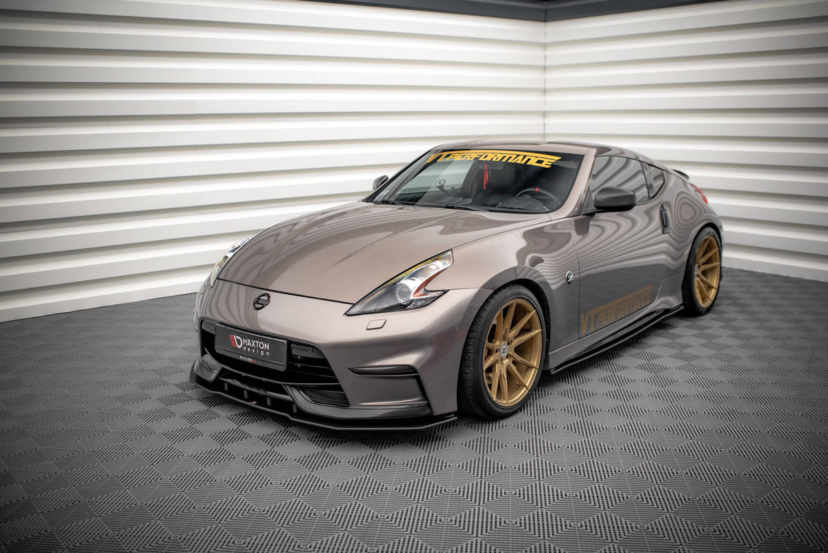 Nærbilde av blank svart ABS-overflate på sideskjørt diffusor for 370Z Nismo