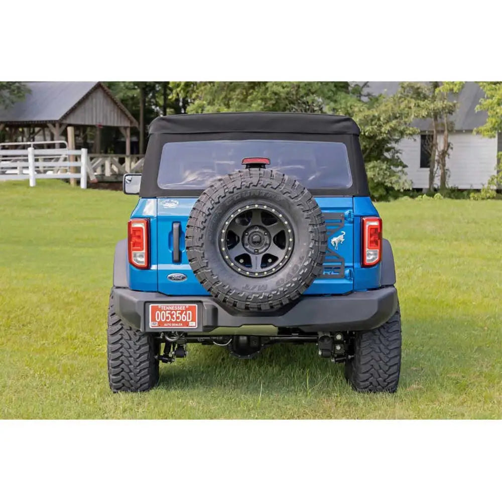 Repositioning av Reservehjulholder med Klaffforsterkning - Ford New Bronco 4 d 21-