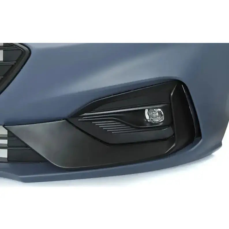 Frontbumper for Ford Focus 18-21 Sport STL i matt blå, med svart plastdeksel og integrert tåkelykt.