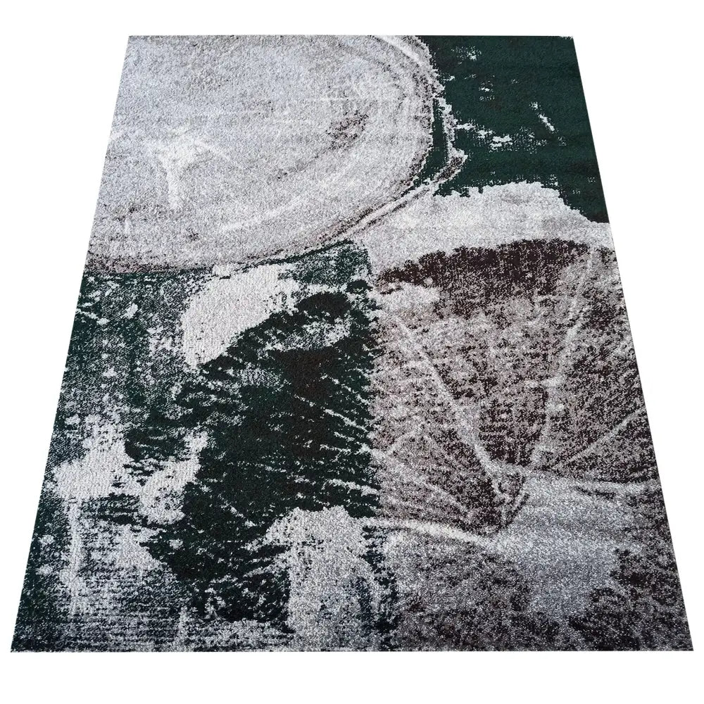 Tepe Otto teppe 200 x 290 cm, sett ovenfra med abstrakt grått og mørkegrønt naturmønster.