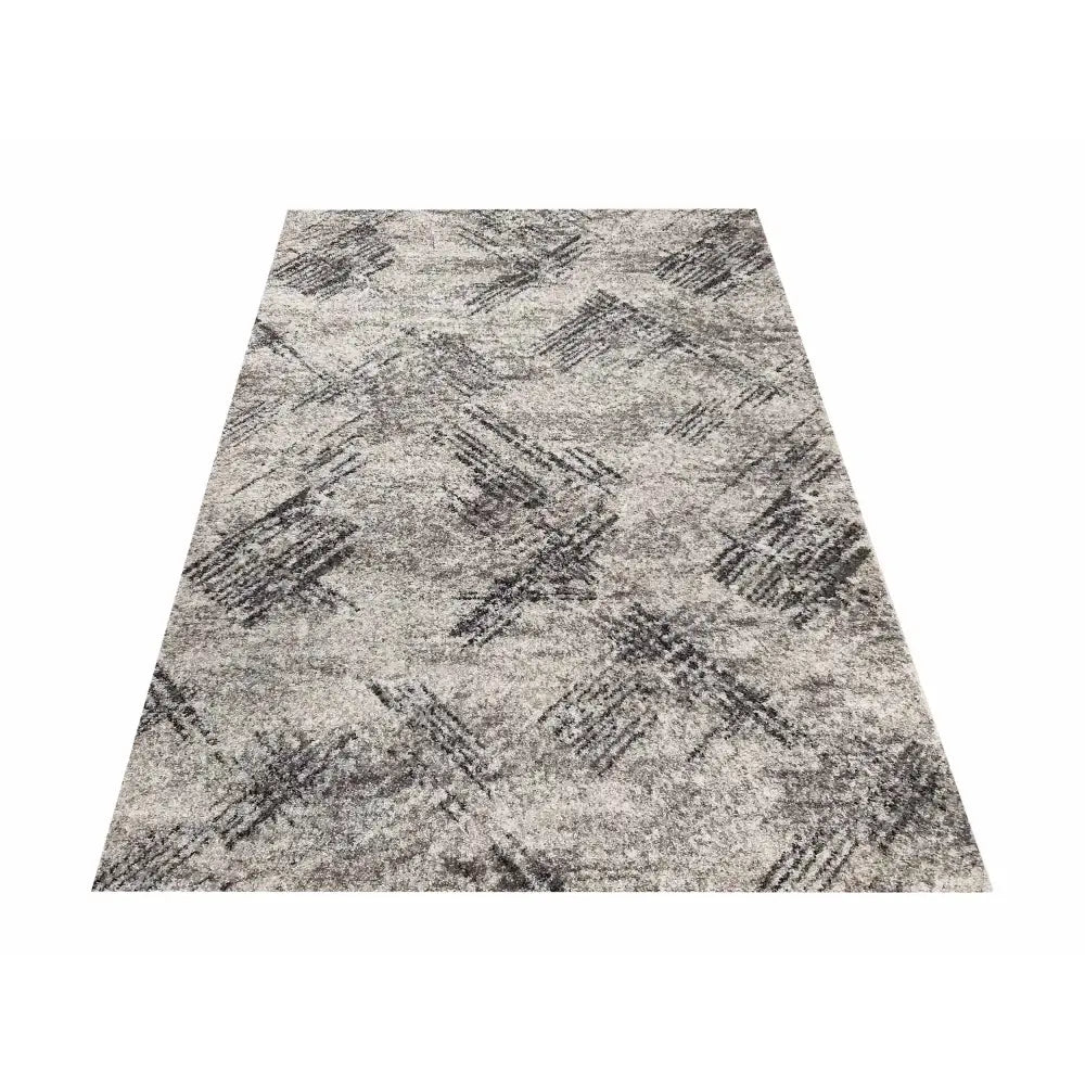 Tepe Panamero 02 grått teppe 200 x 290 cm, skrå oversiktsvisning med abstrakt mørkt rutemønster.